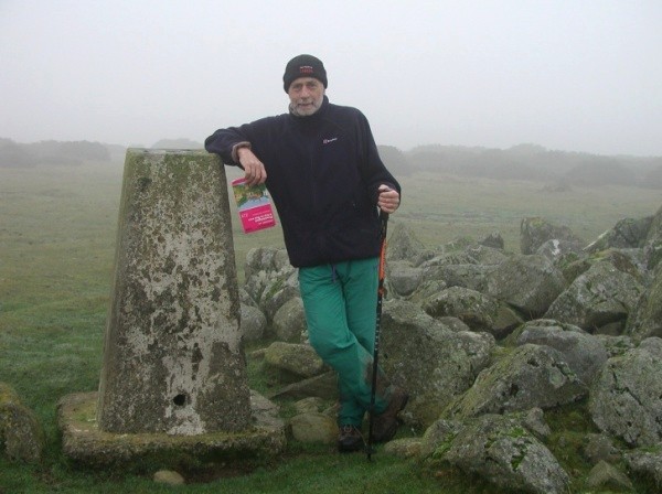 Peter Standing on his last English Marilyn, Hergest Ridge