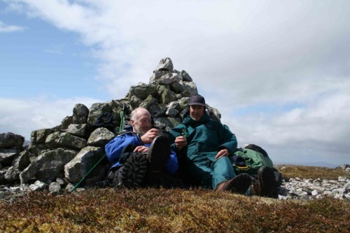 Colin Crawford (left) celebrates reaching his 1500th Marilyn, Creag Scalabsdale, with Chris Peart