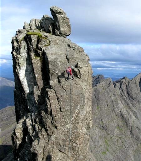 Audrey Litterick descending a certain summit on Skye