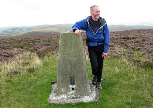 Rob Woodall on Red Hill, his final Welsh trig (photo: Colin Green)